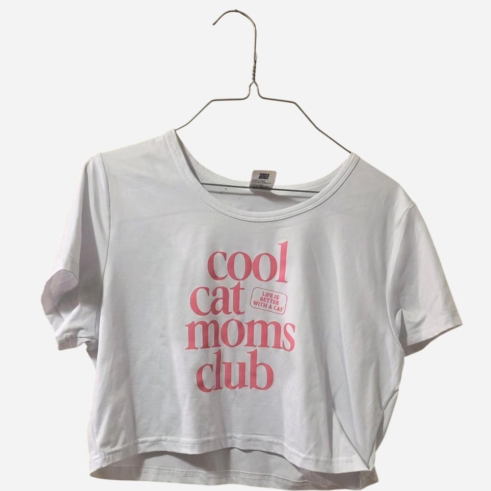 White crop top with pink text reading 'cool cat moms club'